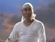 Dokumamushi as Murakawa in The Men Who Made Ultraman: Moon Ship in a Forest of Stars