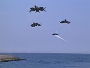 GX00013.jpg (94 KB) Peace Carry following a fighter team.