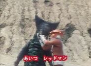 Redman fighting Gomora in the opening to Redman