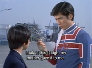 Kotaro shows the Ultra Badge