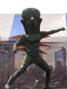 Alien Messie as he appears in stage shows