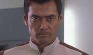 Watanabe as Akio Ishimuro in Ultraman Gaia: Gaia Again