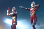 Mebius Phoenix & Zoffy in their ray's stance