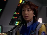 Atsuko looks at Agul