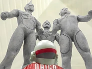 TigaTeam.png (1.31 MB) Daigo melihat ke arah tugu-tugu itu