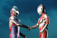 Tiga and Ultraman shake hands