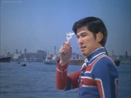 Kotaro gives the Ultra Badge back to The Lady in Green