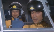 Taijima (left) and Harada (right) return to help UGM fight their last monster