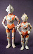 On the left side is the Marusan big size Ultraman. 11-1/2 inches tall, 1967. With second edition Marusan Ultraman.