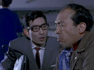 Katsube as an Intellectual-looking Salaryman in Ultraman