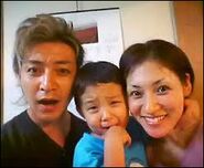 Takeshi with his wife and son