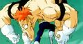 Vegeta slams Recoome in the stomach while in midair