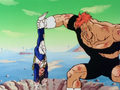 Recoome pulls Vegeta out of the ground