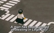 A man has been spotted protesting in Lego City! start the new millitary tanks!