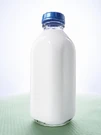 Milk in a sealed acid-proof container.