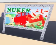 An advertisement on a  billboard, promoting Nukes.
