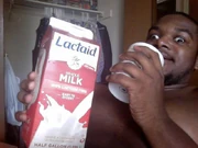 A man about to suffer the side-effects of drinking whole milk.