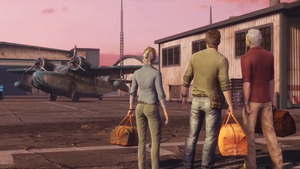 Nate, Elena and Sully look at Sully's new plane