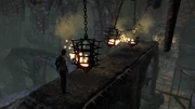 Nate standing before a set of deadly rocking lanterns.
