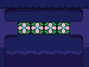 Quatre Graines de Pont ont éclos et forment un pont.