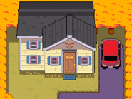 Дельта-руна с перевёрнутыми треугольниками над дверью и на коврике перед дверью дома Дримурров