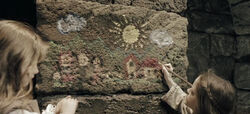 Cecilia painting in William’s prison and Selene holding the key to William’s cell