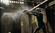 Selene shoots at Lycans in the Lycan den.PNG