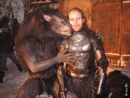 A joke behind the scenes image of actor Tony Curran with a Werewolf.