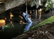 Sherman’s car being recovered by volunteer divers in 2024