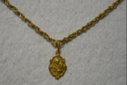 Gold religious medal