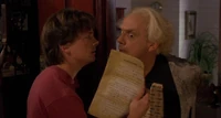 Marty showing Doc the letter which Doc's future self had sent him.