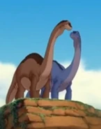 Littlefoot's mother (blue) with Bron; seen in a flashback in The Land Before Time X: The Great Longneck Migration.