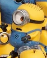 A small one eye Minion with buzz cut hair.