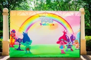 Synth in a photo-op for Trolls: TrollsTopia at DreamWorks Destination