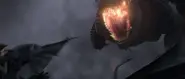 Toothless shooting a plasma blast down the Red Death's throat.