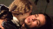 Lestat turning Louis into a vampire.