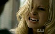 Caroline Forbes, a newborn vampire, begins to feed.