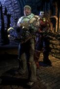Promotional art of Unreal Tournament 3, then UT2007, featuring Malcolm and a Necris.