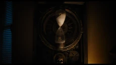 The hourglass signifying the restart of a night.