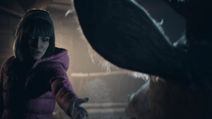 Beth approaches the deer