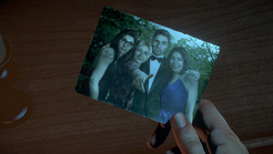 Hannah showing off her tattoo with Sam, Mike, and Emily in the Prom Night Photo.