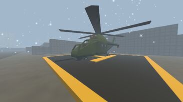 Front View of the Olive Attack Heli while snow is falling
