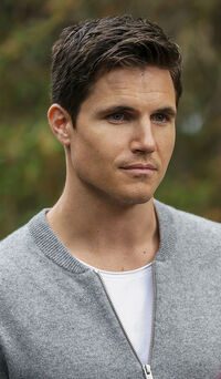 Nathan Brown portrayed by Robbie Amell