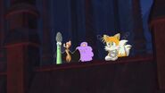 Tails all chained up while his friends tries to help him