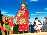 Batman, Ultraman and Kanegon in the background