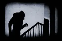 The iconic shot of his shadow ascending a staircase