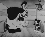 Pete and Mickey in Steamboat Willie