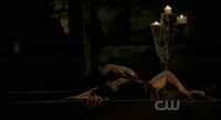 Mikael feeds on Katherine to regain his strength.