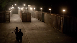 Lily and Enzo arrive at the address, with no warehouse in sight