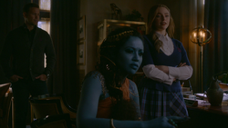 The jinni listens to Alaric and Hope's conversation.